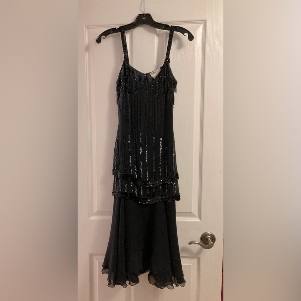 Gorgeous Vintage Beaded Dress. 100% Silk. Sequins and beads. Size Small.